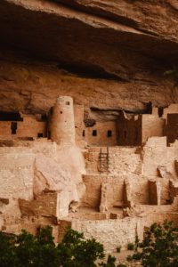 Ancient buildings by the Ancestral Pueblo people built into the mountain